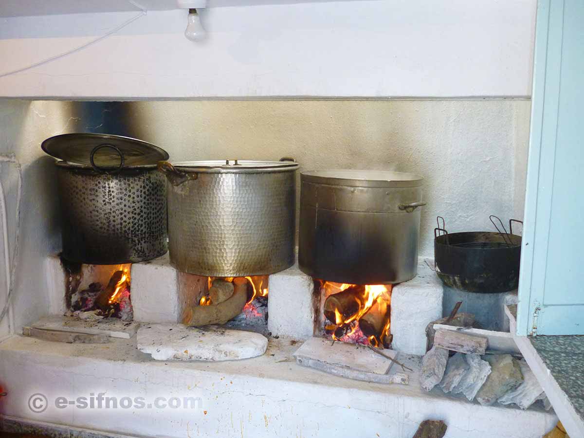 Cooking in large cauldrons for the feast at Stavros in Faros on September 13