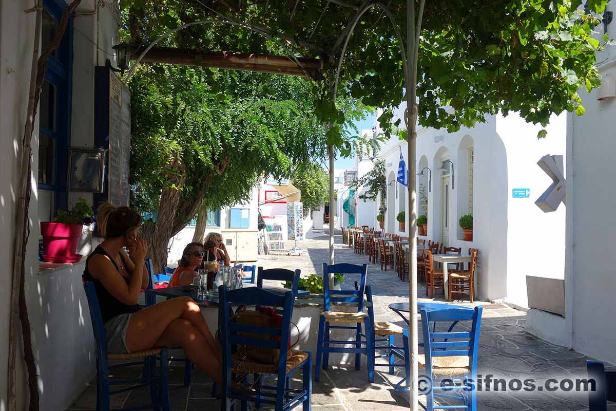 Enjoying the first coffee at the central alley of Apollonia