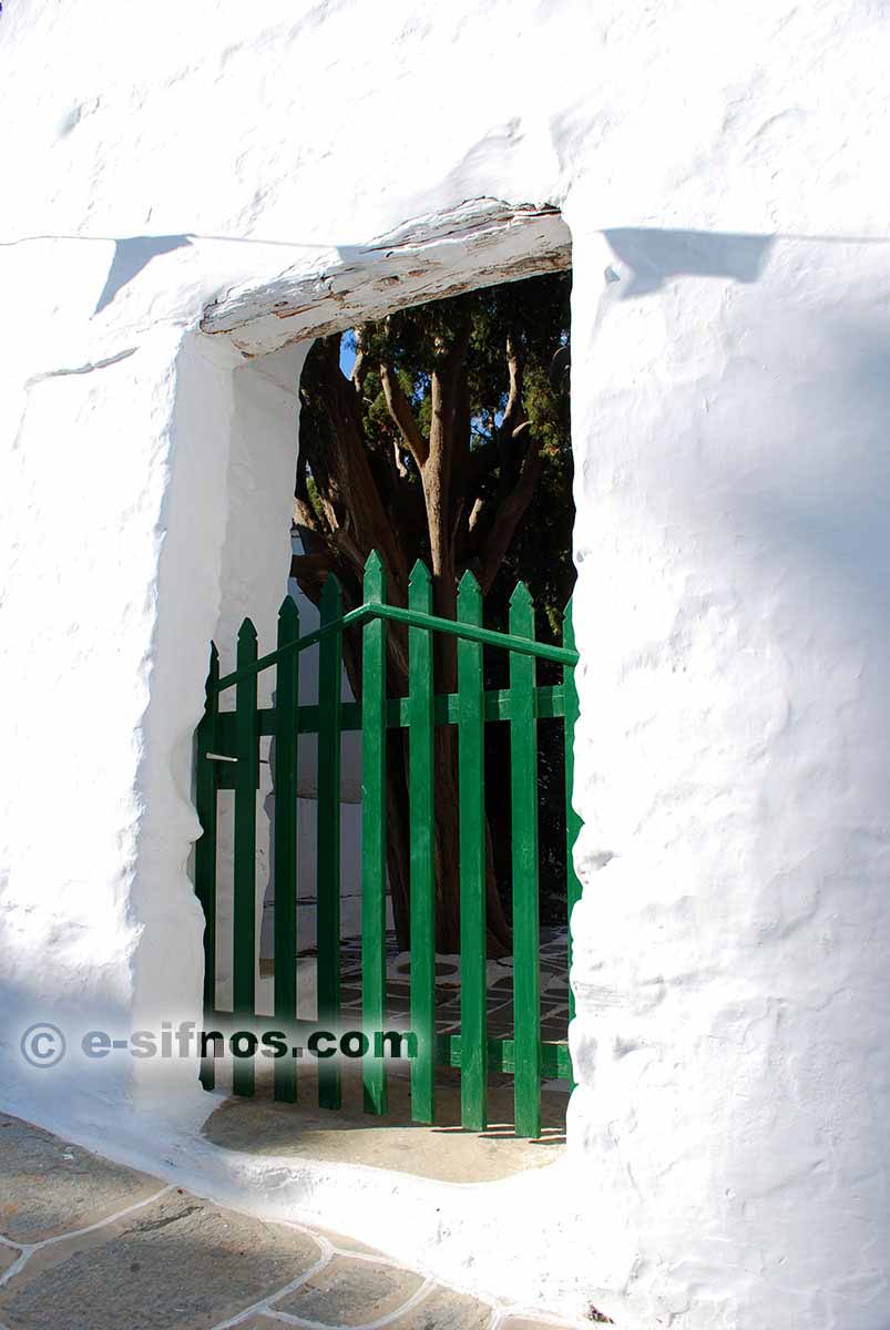 A wooden green door in Apollonia